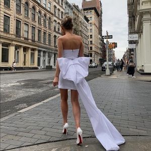 Adore white dress with bow detail frm Revolve. Luxurious bachelorette dress